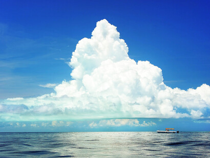 Clouds rising above the water