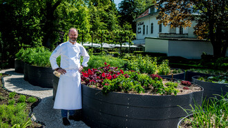 Chef Pascal Devalkeneer in his potager at Le Chalet de la Forêt