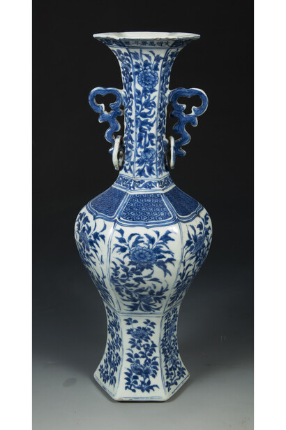 Blue + White porcelain vase. Porcelain vase with blue floral decoration