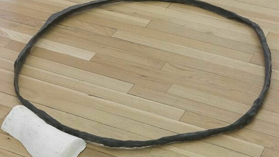 Esther Kläs, nie, 2013, resin, iron powder, plaster, 2 1/2 x 41 x 37 1/2 inches (6.4 x 104.1 x 95.3 cm)