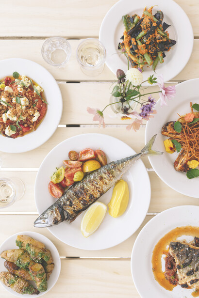 Featuring Maria Bell's photography, the menu at Water Lane from September 2022 is elegantly presented