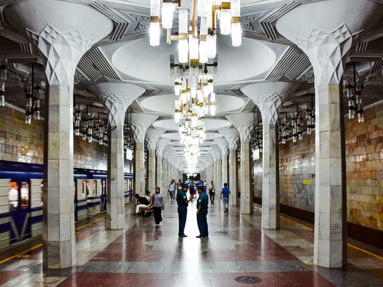Ornate ceiling and chandeliers at Mustakillik Maydoni Metro Station, Tashkent, Uzbekistan