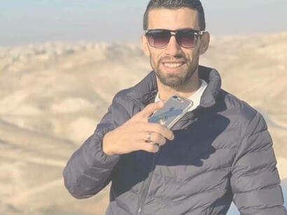 A Palestinian inspired by the words from the poetry of Mahmoud Darwish