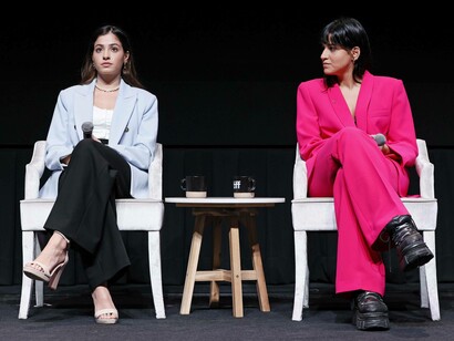Yusra and Sara Mardini speak onstage at "The Swimmers" press conference during the 2022 Toronto International Film Festival at TIFF Bell Lightbox on September 9, 2022 in Toronto, Ontario