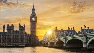 A golden sunset casting long shadows over Westminster and the Thames, representing the fading glow of Britain’s former global authority