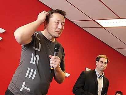 Elon Musk addressing the audience at Tesla Amsterdam cervice center on January 31, 2014, photo by Maarten Van Aerde
