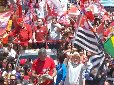 Supporters wearing the red colours of the Workers’ Party join Luiz Inácio Lula da Silva at his closing campaign rally in São Paulo, Brazil