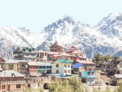 An enchanting view of Himachal Pradesh, India, where verdant forests, misty mountains, and idyllic villages blend harmoniously to create a haven of peace and beaut