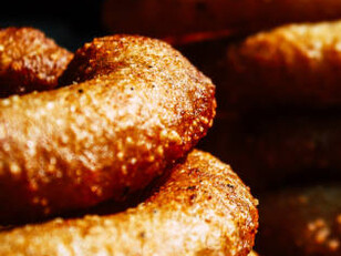 Sel roti is a traditional rice bread from Nepal that is prepared with a fermented rice batter and fried into a ring