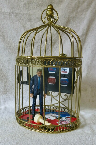 Issa Ibrahim,
Trader in a Gilded Cage,
2023,
Found objects, acrylic, in vintage birdcage,
14 x 7½ in/35.6 x 19.1 cm. Courtesy of the artist and Fountain House Gallery