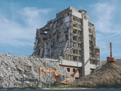 Fractured ruins strewn across the ground, reflecting how soon stability can give way to chaos