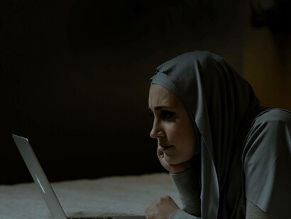 Hyperfocused on her laptop