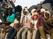 A tightly packed group of immigrants