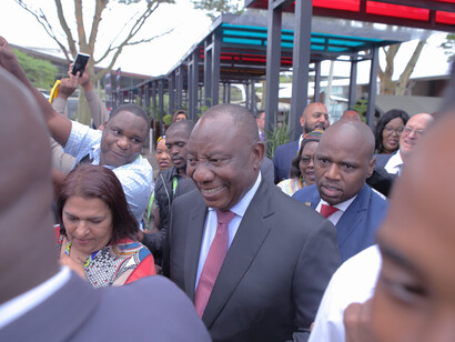 President Cyril Ramaphosa’s presence in the crowd reflects a commitment to inclusivity and the shared journey of South Africa's democracy