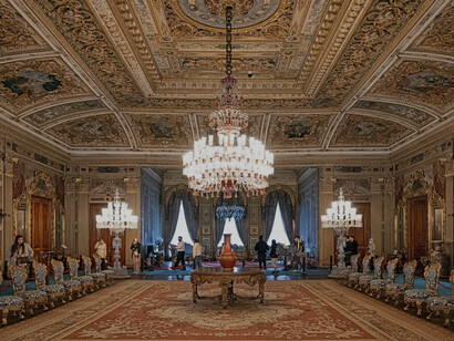 The Blue Saloon in Dolmabahçe Palace, Istanbul, is a stunning room that exemplifies the palace's opulent design. It features intricate craftsmanship, high ceilings, and grand chandeliers, including the world's largest Bohemian crystal chandelier
