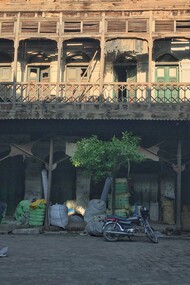 A motorbike outside a building in Qissa Khwani Bazaar, Peshawar, Pakistan 