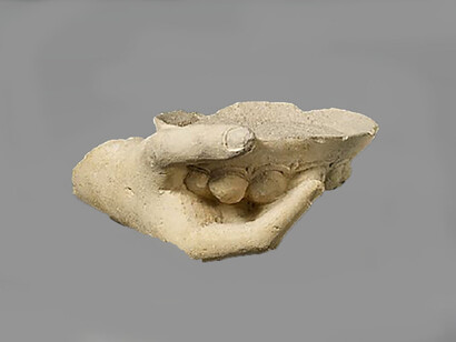 Limestone statue fragment of a right hand holding a phiale (libation bowl) late 6th–5th century B.C.