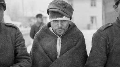 Soviet prisoners of war dressed in new clothes near the Arctic Circle at Rovaniemi, Finland, during the Winter War, fought in temperatures down to −43 °C 