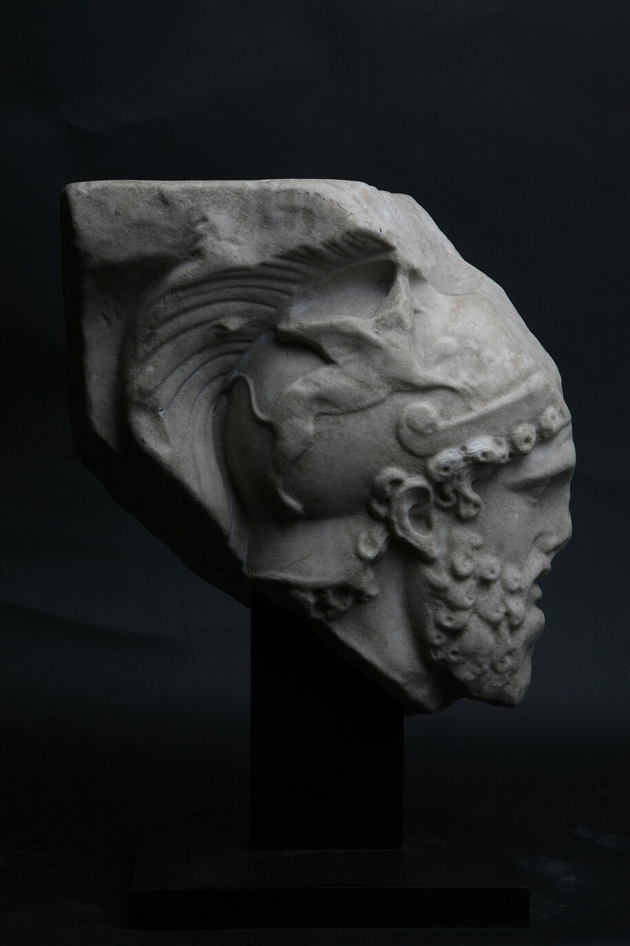 Roman relief fragment depicting the head of Mars, 2nd century AD, Marble, Courtesy of Rupert Wace Ancient Art