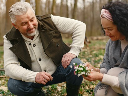 A couple looking at some flowers together.
Intimacy and affection play a vital role in love in older age 