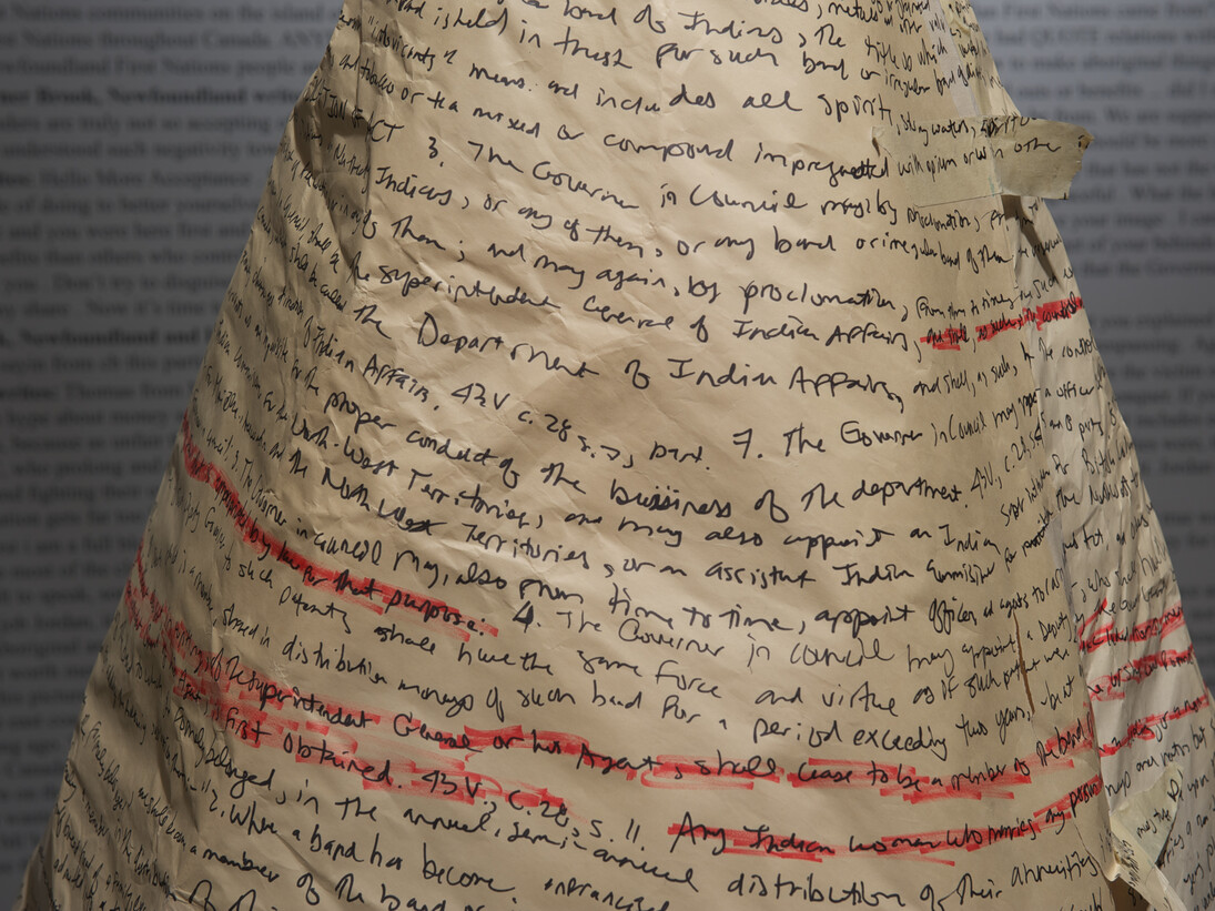 Hallway (9): Jordan Bennett, Sovereignty Performance | Cérémonie de la souveraineté (2009), recycled paper, burnt trees, regalia | papier recyclé, arbres brulés, costume traditionnel, courtesy of the artist | avec la permission de l’artiste
