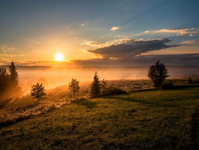 Eyes would open, to see a usual morning extraordinaire, nature and the sun rising over the clouds