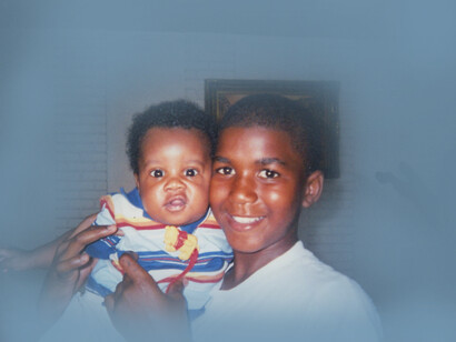 Trayvon Martin, age 11, played with one of his cousins. Trayvon was fatally shot by a neighborhood watch volunteer last month as he returned to a Sanford home during a visit from Miami, Florida, USA