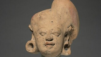 An eastern Java, Majapahit Dynasty, female head from 1978 present in Sonobudoyo Museum, Yogyakarta, Indonesia 
