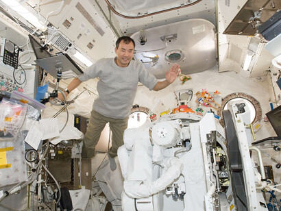 Japan Aerospace Exploration Agency astronaut Soichi Noguchi, Expedition 22 flight engineer, is pictured near the Japanese Experiment Module Remote Manipulator System (JEMRMS) Small Fine Arm (SFA) inside the Kibo laboratory aboard the International Space Station