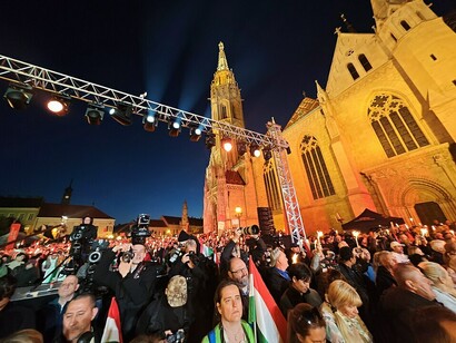 People wave Hungarian flags and gather in central Budapest after the 2026 elections delivered a landmark victory for Péter Magyar and the Tisza Party, signaling a new chapter in Hungarian politics