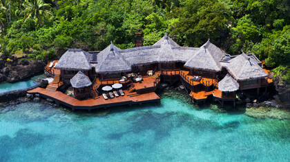 Laucala, Aerial view of an overwater villa