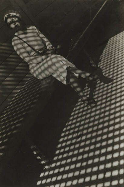 Aleksandr Rodchenko (Russian, 1891–1956). Girl with a Leica. 1932–33. Gelatin silver print. 11 13/16 x 8″ (30 x 20.3 cm). The Museum of Modern Art, New York, Thomas Walther Collection. Gift of Shirley C. Burden, by exchange