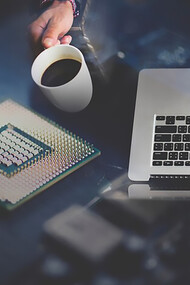 Computer programmer working on a laptop