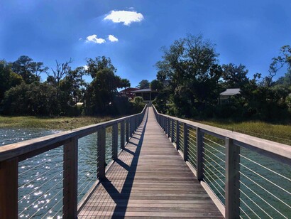 A long and narrow bridge connecting the world to Palmetto Bluff. Photo by Jamie Edwards
