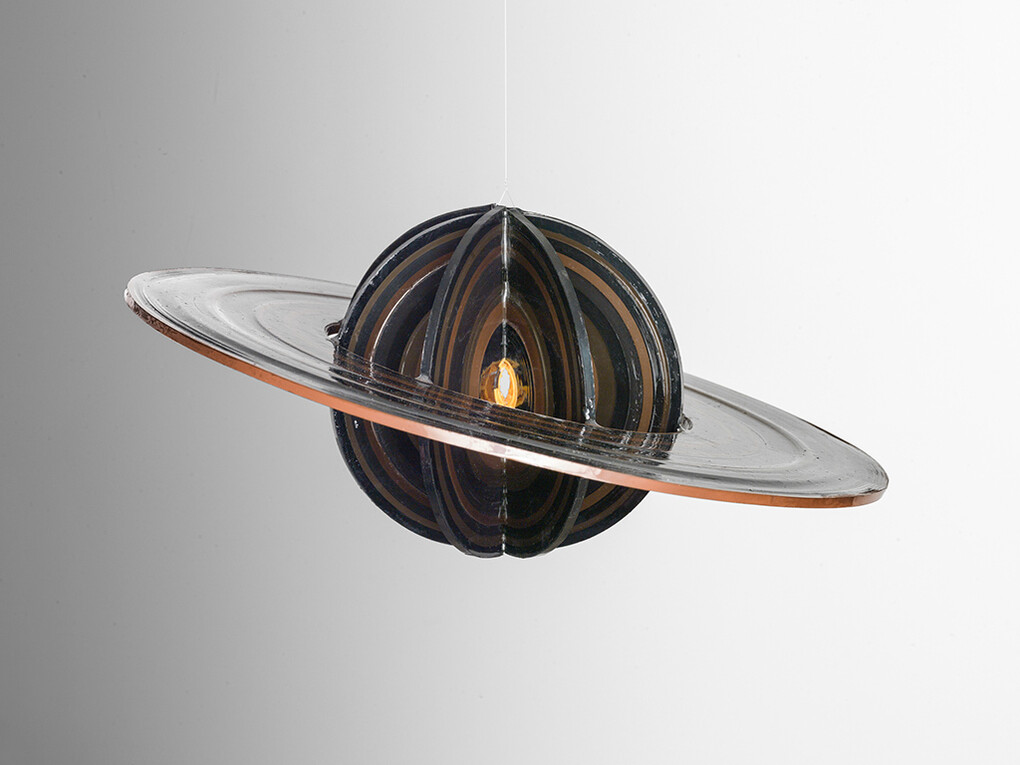 Gregor Hildebrandt, Mass, Zahl und Gewicht, 2015, cassette tape, cassette wheel and epoxy, 14 x 32 cm