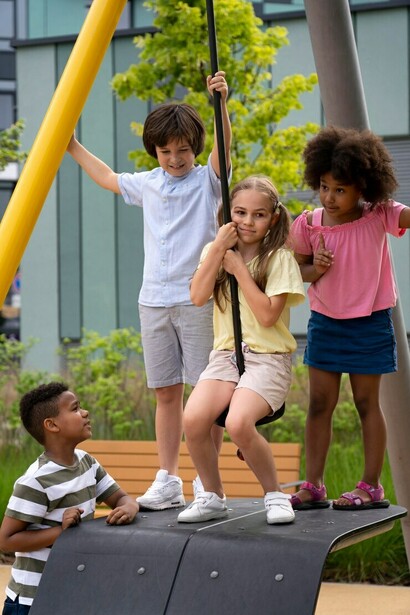 A group of friends having a great time at the playground