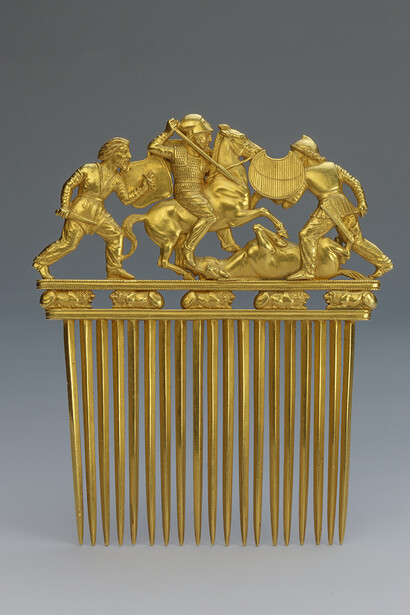Excavated by N.I. Veselovsky, Comb decorated with a battle scene, scythian culture, turn of the 4th century BC. Courtesy of State Hermitage Museum