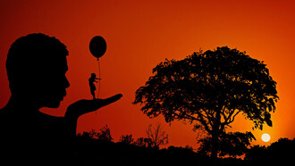 An illusion of a woman holding a balloon on the hand of a man during a sunset as he looks at her with awe at her confidence