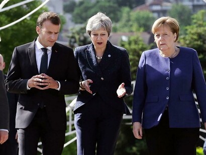 Macron, May e la Merkel