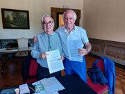 Francisco Rojas Aravena, Rector of the United Nations University for Peace, and Salvatore Grasso, author of the Anthem of the United Nations University for Peace, at the signing