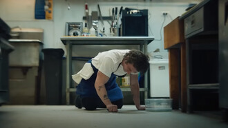 Jeremy Allen White as Carmen ''Carmy'' Berzatto from The Bear cleaning the floor