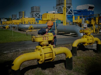 An engineer tightening the valves on one of the gas pipelines in Uzhhorod, Ukraine