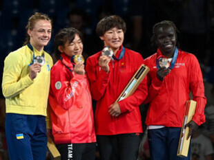 Victory ceremony of the Women's freestyle 62 kg event at the Champ de Mars Arena, Paris, France