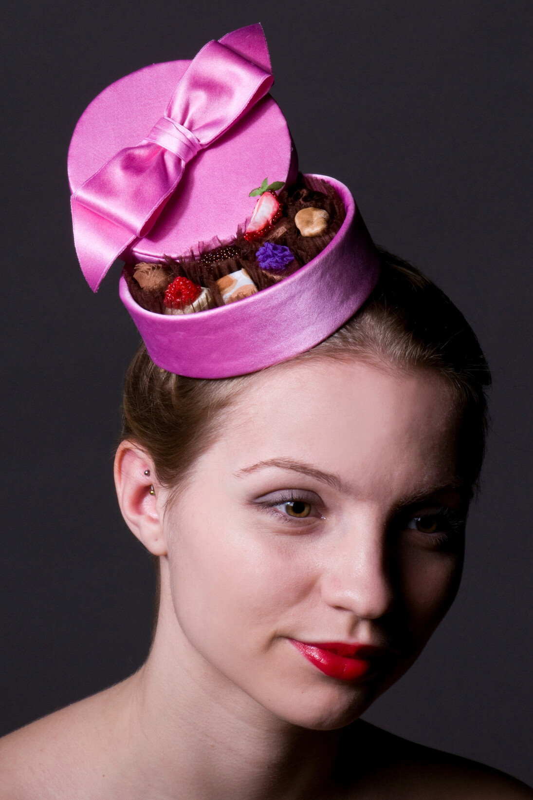 Deirdre Hawken, Pink Chocolate Box headpiece: Duchesse silk, silk organza, Silk taffeta, beads and mixed media. Diameter 12 cm Height 12 cm