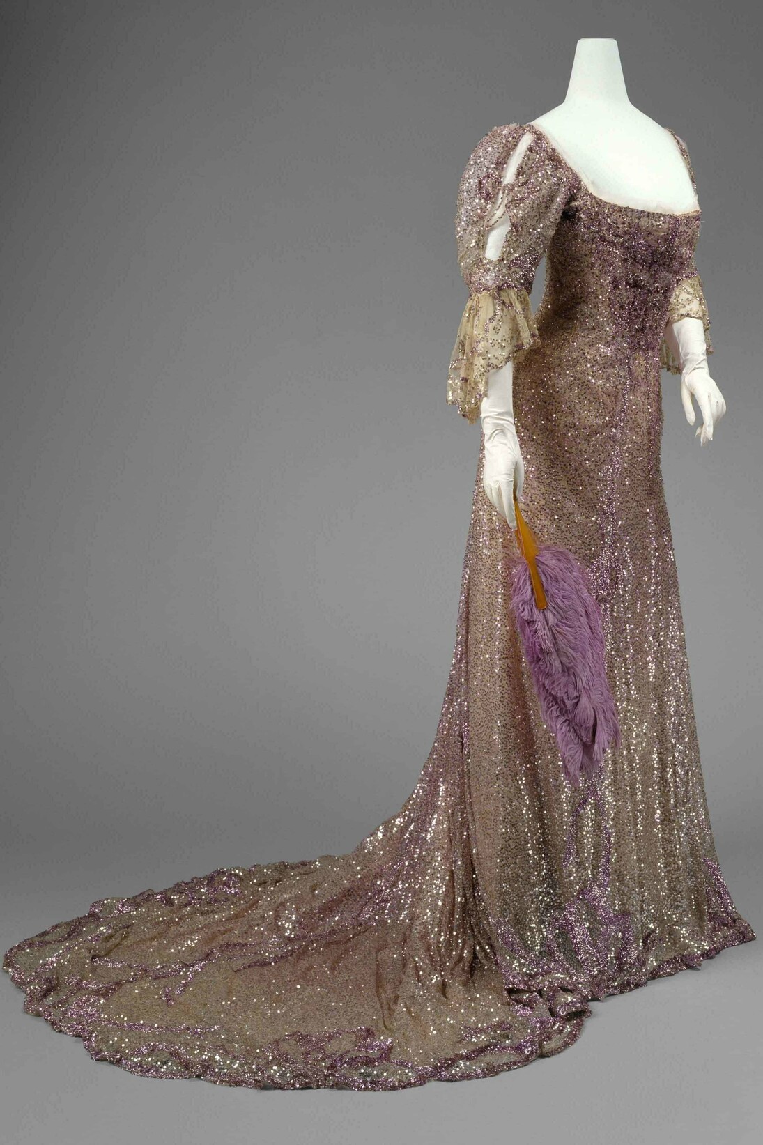 Henriette Favre (French), Evening Dress, 1902, Worn by Queen Alexandra (British, born Denmark, 1844–1925)
Mauve silk tulle, sequins. The Metropolitan Museum of Art, Gift of Miss Irene Lewisohn, 1937 (C.I. 37.44.1). Photo: © The Metropolitan Museum of Art, by Karin L. Willis