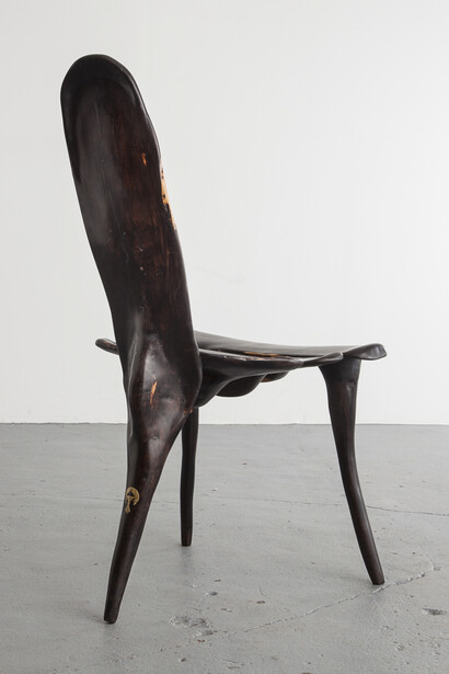 Sculptural "Vertebre" chair in ebony. Designed by Babacar Niang, Senegal, 2013. 21.65" L x 16.54" W x 37.8" H / 55cm L x 42cm W x 96cm H. Photo by Joe Kramm/R & Company