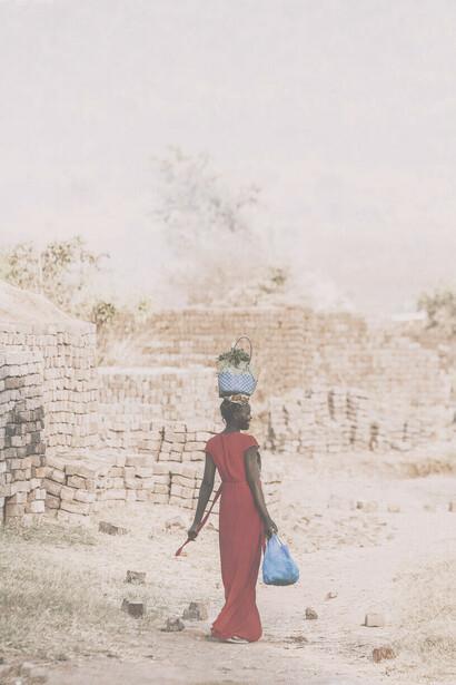 Tanzanian woman returning from the market
