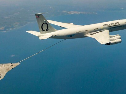 The Omega tanker dragging an AI plane