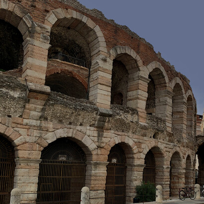 Arena di Verona, Veneto, Italy, the historic Roman amphitheater, glowing under a sky