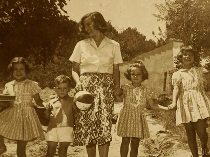 Con cuatro de sus hijos